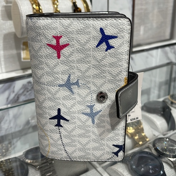 ХMichael Kors Medium Saffiano Leather Bifold Wallet 
Optic White Aeroplane
NWT - Picture 11 of 16